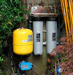 Water tank servicing